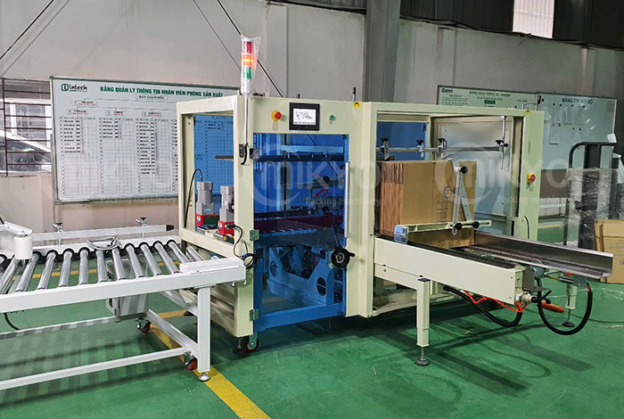 Máy cấp và dán thùng đồng thời 